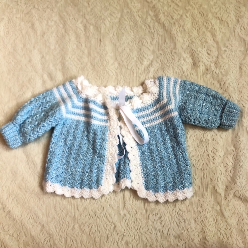 Adorable hand crocheted girls ribbon sweat…